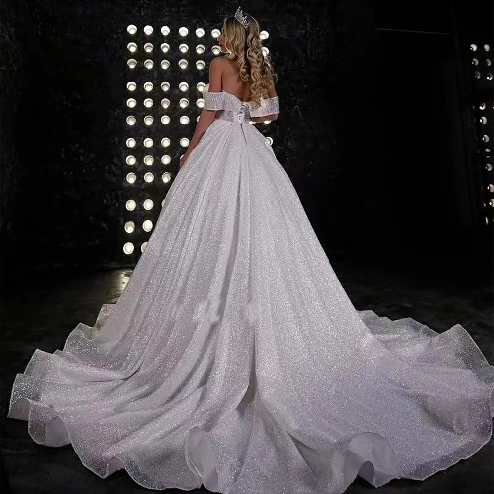 Abito da sposa in tulle luccicante con spalle scoperte Scollo a V con lacci Soffice strascico a spazzola Foto reali personalizzate di lusso Abiti da sposa brillanti