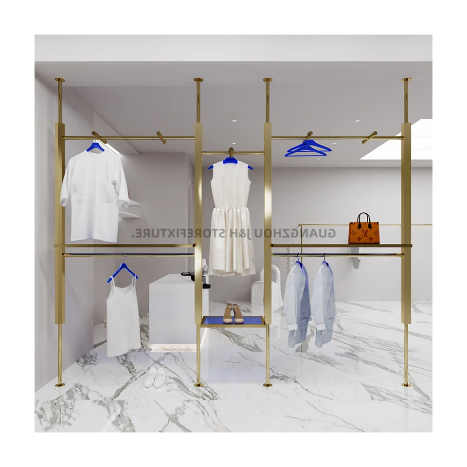 ราวแขวนเสื้อผ้าติดผนังแบบกำหนดเอง สำหรับร้านขายเสื้อผ้าผู้หญิง ทำจากสแตนเลสสตีลสีทองไทเทเนียม