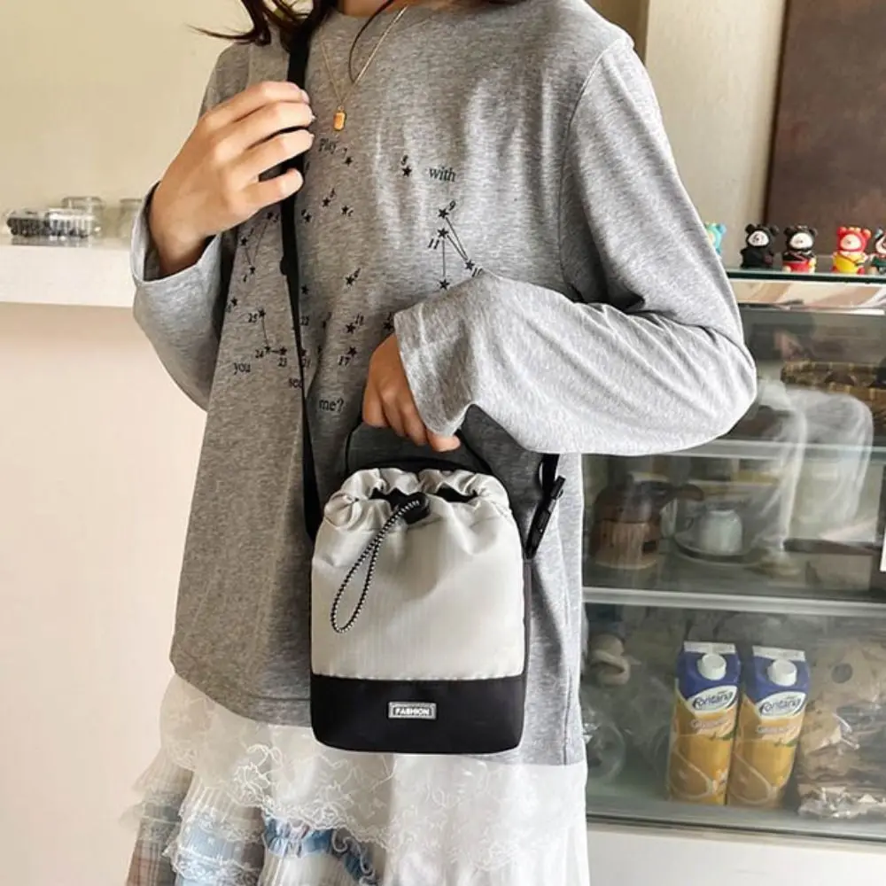 

Fashion Nylon Drawstring Shoulder Bag Lightweight Korean Style Phone Bag Adjustable Strap Large Capacity Bucket Bag Male