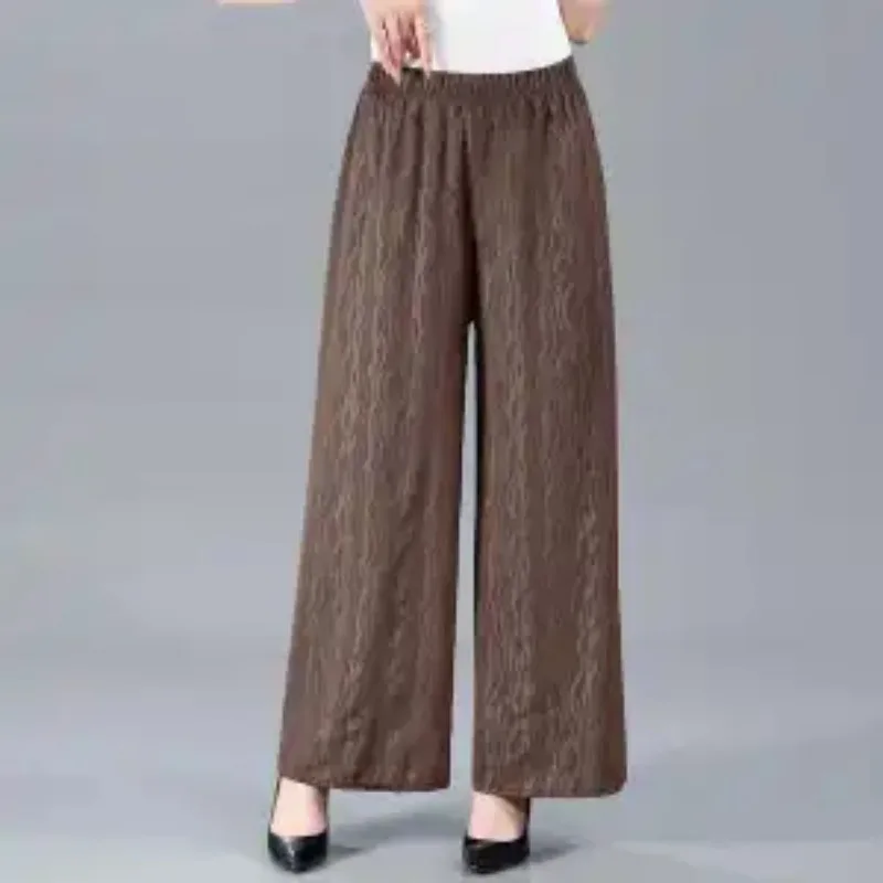 

Женские широкие брюки оливкового цвета с волнистым узором, на резинке, свободного кроя