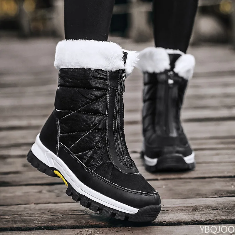 Winter cotton padded thick warm windproof and anti-skid snow boots outdoor thick soled round toe zipper short tube women's boots