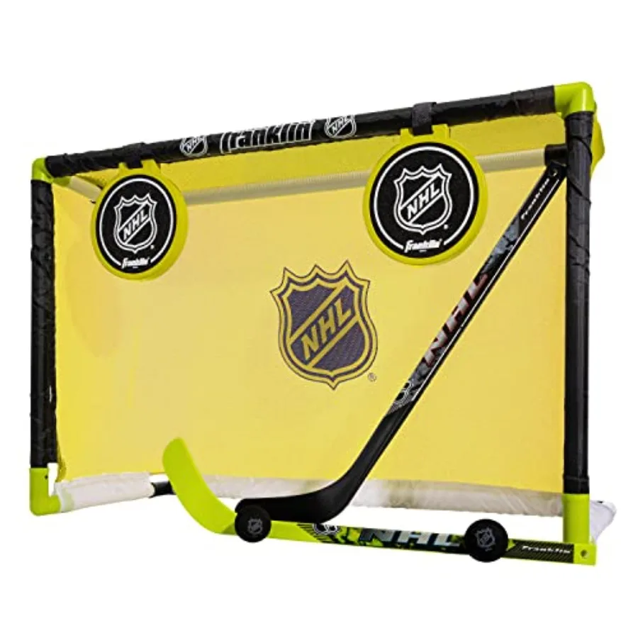 

Indoor knee hockey goal set with durable plastic frame, black color, includes 2 shinny sticks, 2 foam balls, and pop-out shooti
