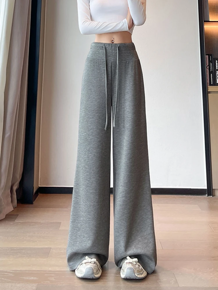 Koreańskie spodnie sportowe typu stringi z wysokim stanem, damskie, jesienne, nowe, jednokolorowe, zwiewne, z szerokimi nogawkami, uniwersalne, wyszczuplające.