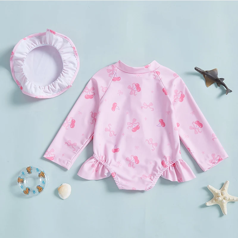 Traje de baño de protección contra sarpullidos para niños pequeños, traje de baño de 1 pieza con cremallera, patrón de lazo, cremallera, manga larga, cuello redondo, traje de sol para niñas con sombrero