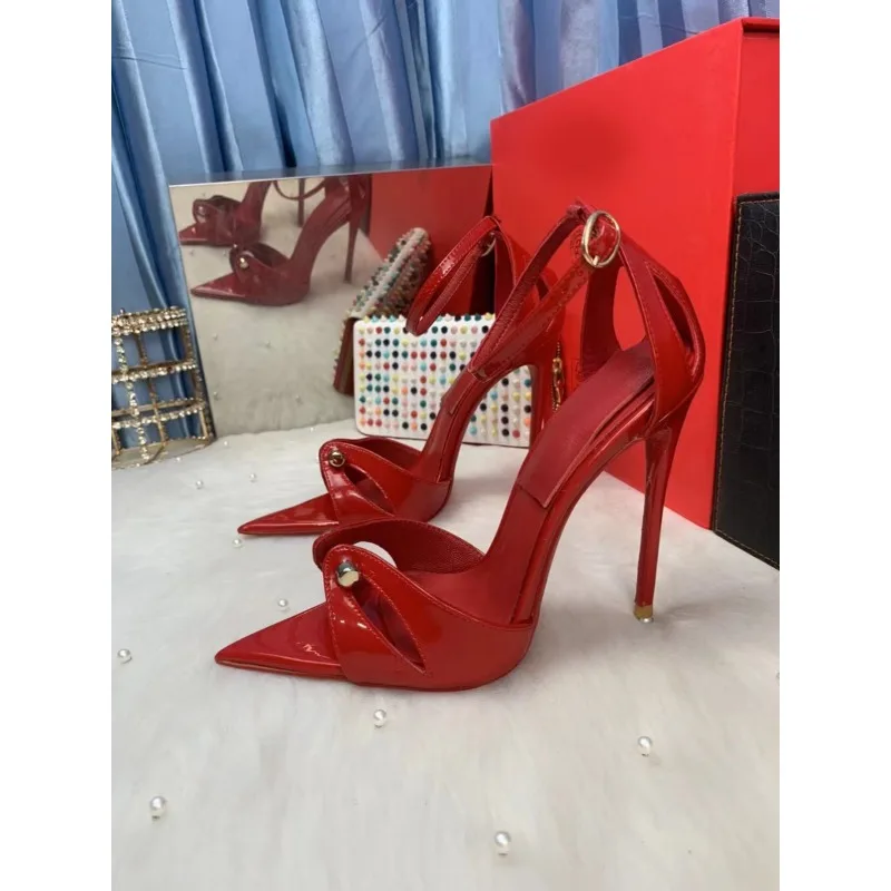 

European and American sexy open toed pointed thin heel, red patent leather metal buckle, super high heels,straight strap sandals