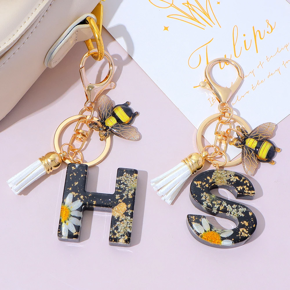 黒色樹脂レターキーホルダー金箔ひまわりイニシャルキーリング蜂 - Resin Art Alphabet のレビューと価格