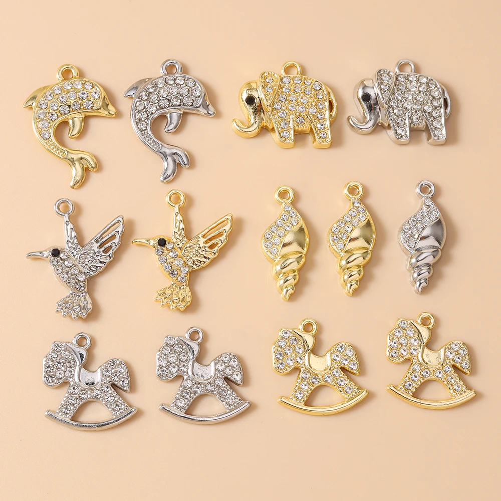 Leslie 10 Stück Gold- und Silberfarbene Kristall-Muschel-, Vogel-, Delfin- und Elefanten-Anhänger für Ohrringe, Halsketten und Handgemachten Schmuck – Detail 1