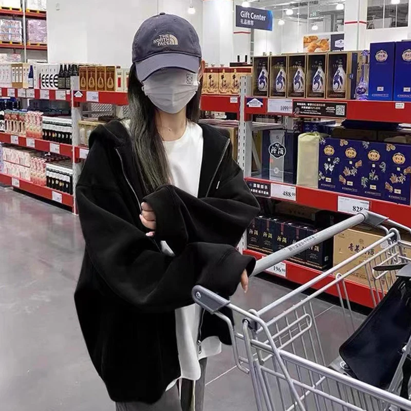 حجم كبير فضفاض سستة هوديس أسود بلون مقنعين بلوزات الموضة الكورية كم طويل جيوب الرباط CYXX086