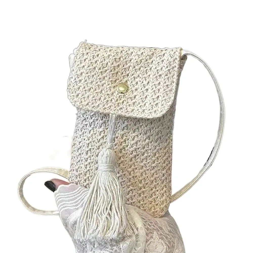 

Portable Weaving Straw Woven Handbag Elegant Long Tassel Crossbody Bucket Bag Handmade Korean Style Woven Beach Bag Female