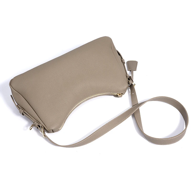 กระเป๋าหนังวัวแท้สไตล์เกาหลีใหม่ แฟชั่นผู้หญิง ทันสมัย เรียบง่าย กระเป๋าอเนกประสงค์ สะพายไหล่เดียวหรือสะพายข้างได้