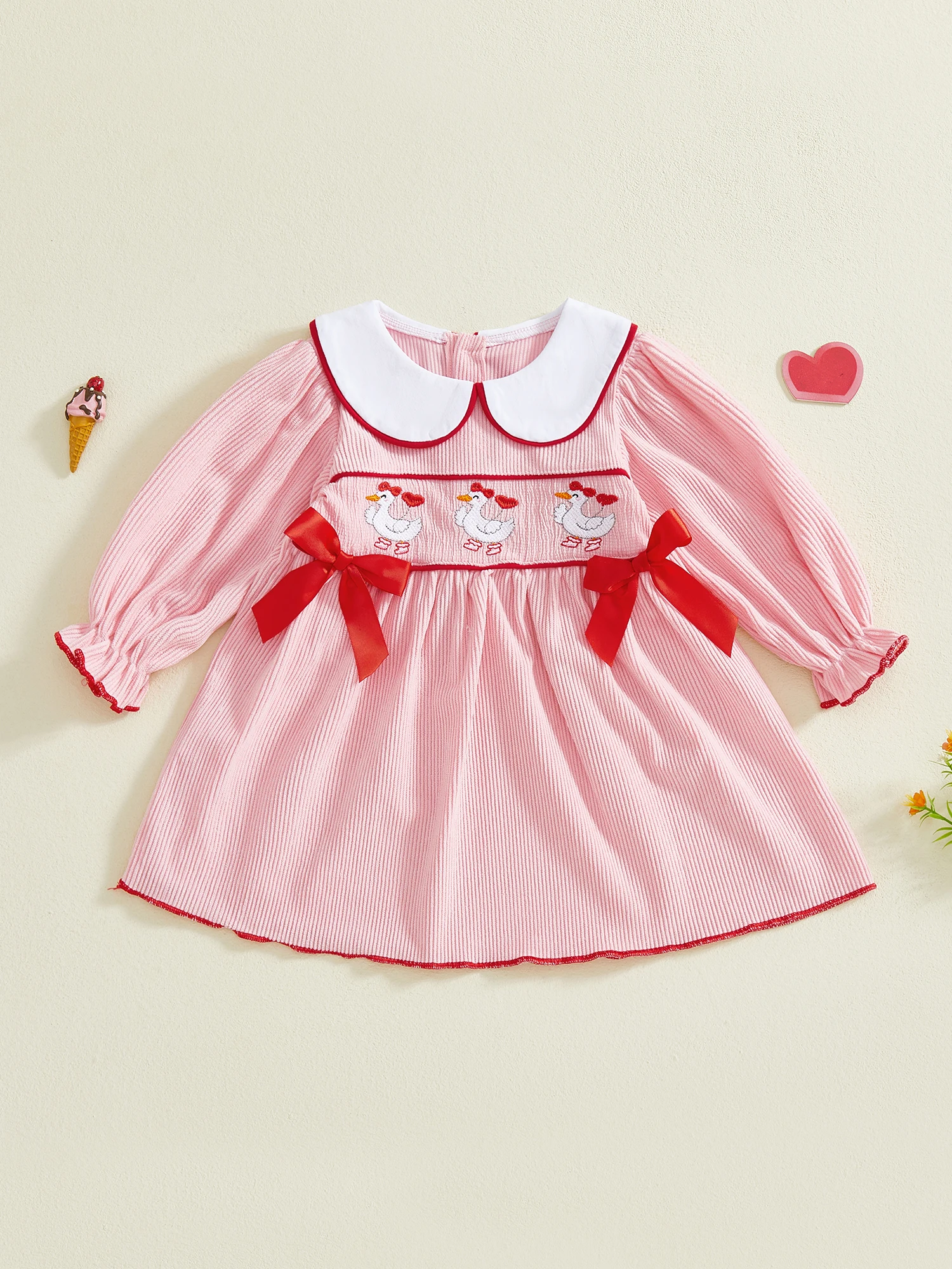 فستان بناتي لعيد الحب بأكمام منتفخة وياقة الدمية وتطريز على شكل فيونكة وتفاصيل على شكل حرف A وصورة ظلية مخططة