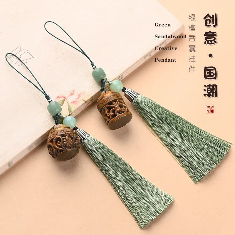 

Free shipping Green sandalwood Chinese style fashion wood lotus sachet pendant mobile phone chain fragrant pills hollow car bag