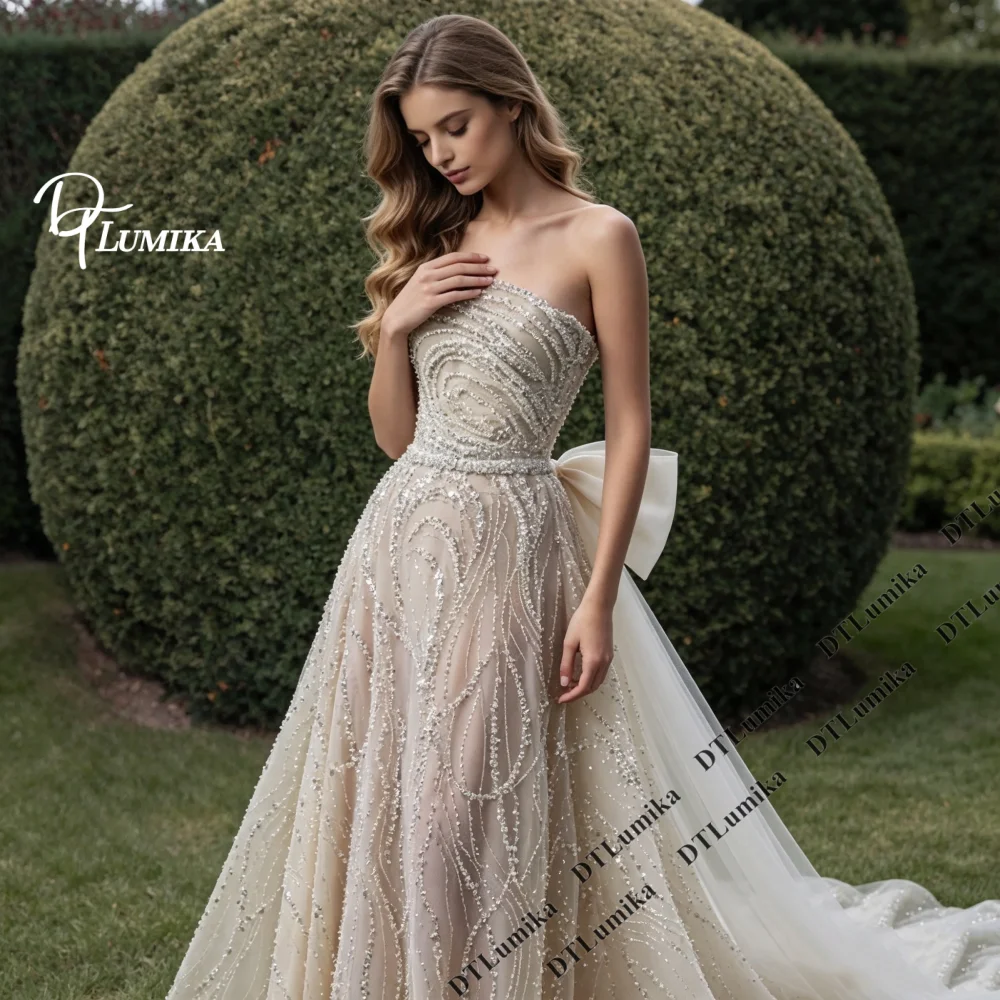 Strapless Champagne Mermaid Wedding Dress Crystal Beaded Tulle Bridal Gown Big Back Bow Sweeping Train Luxury Bride Gown
