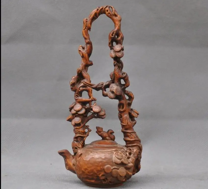 

Chinese Boxwood wood Hand carved squirrel Pine trees Teapot tea pot maker Statue