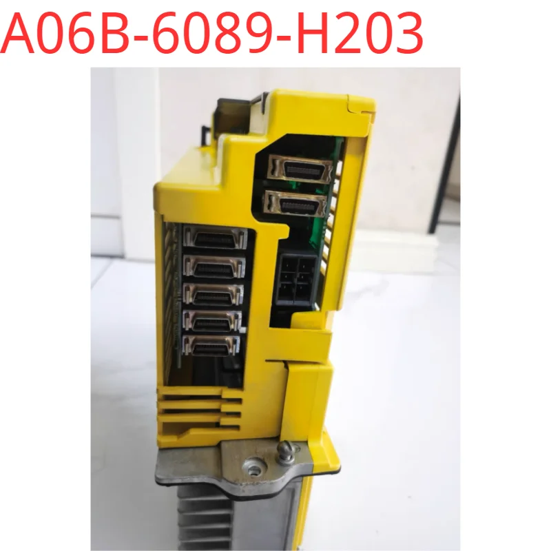 A06B-6089-H203 محرك سيرفو مستعمل تم اختباره جيدًا في حالة جيدة