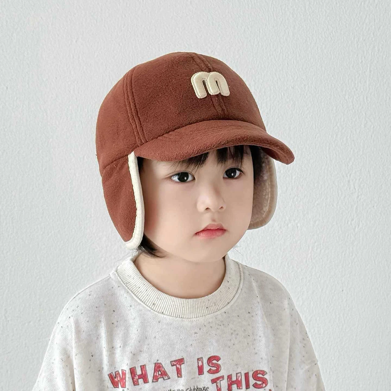 

Winter Baby Baseball Cap Warm Ear Protection Fleece Cap for Kids Boy Girl Solid Color Letter Peaked Cap with Earflap