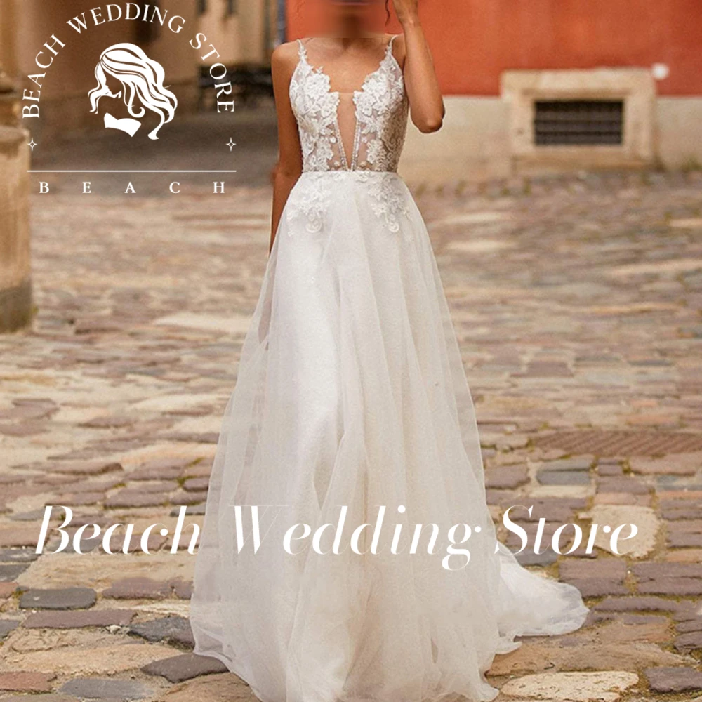 Abito da sposa sexy senza maniche personalizzato da spiaggia senza spalline applicazioni in pizzo che borda il treno senza schienale morbido tulle vestido