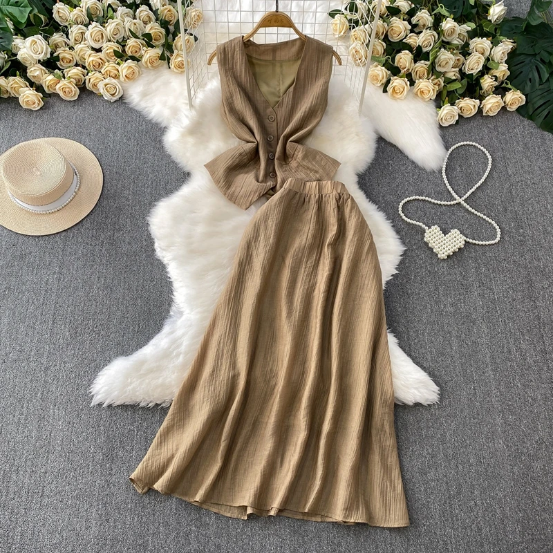 

2025 New Two Piece Suit Fashion Design Back Strap Sleeveless Vest Single Breasted Top and High Waist Slim Skirt Set