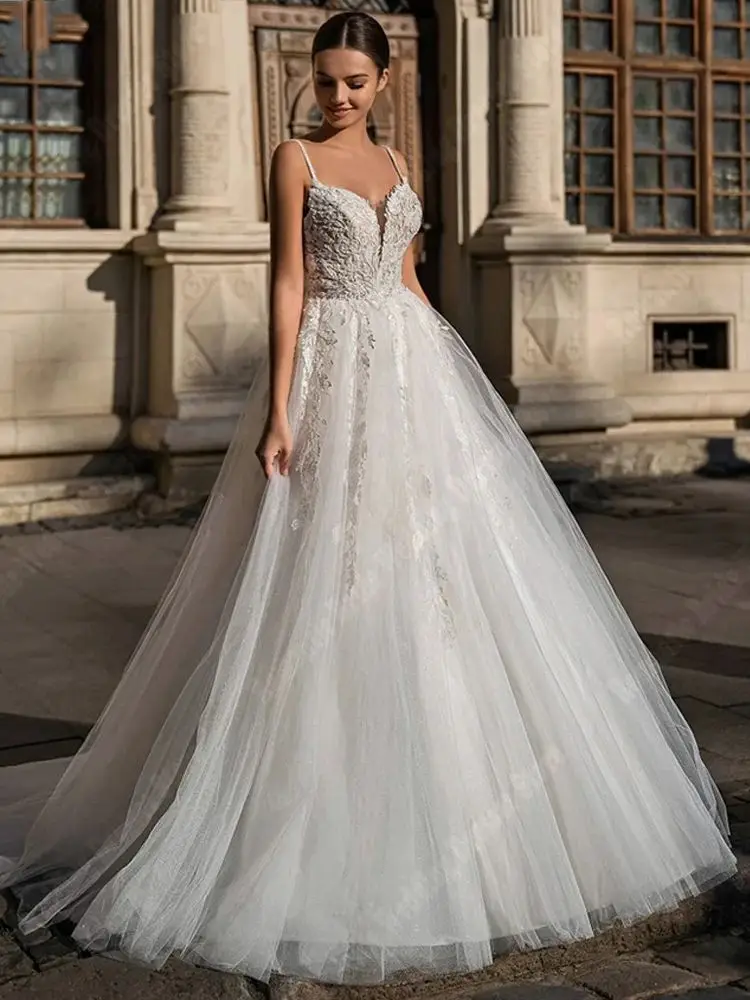 Abiti da sposa Sexy di colore Lvory per le donne 2024 nuovi abiti da sposa senza maniche con scollo A V profondo ricamo con paillettes luminose una linea Robe