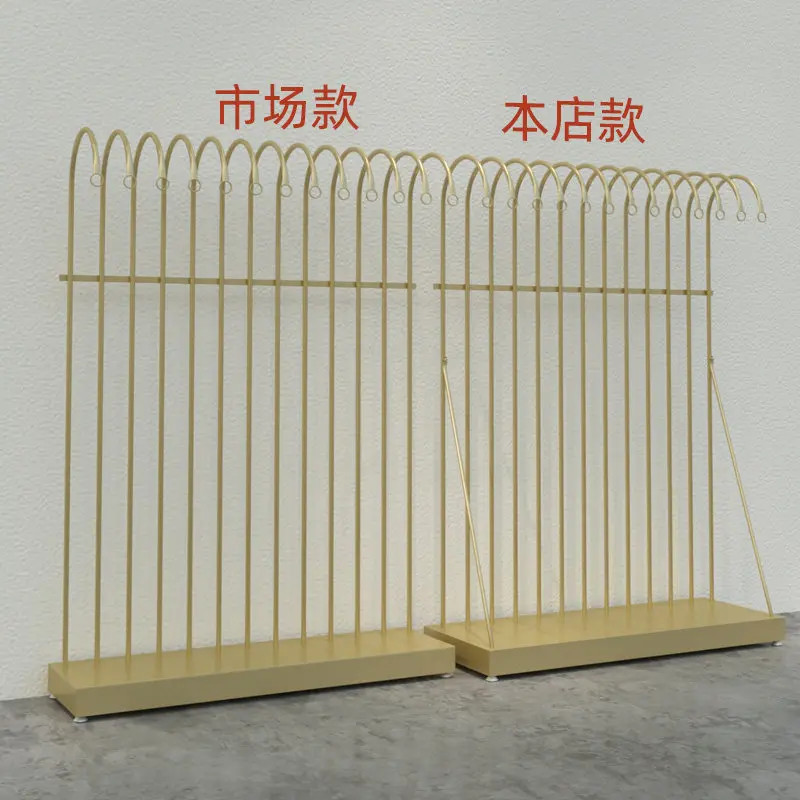 Women's clothing store shelves Clothing store hangers Display racks Floor-to-ceiling hangers Clothes racks Shelves that sell