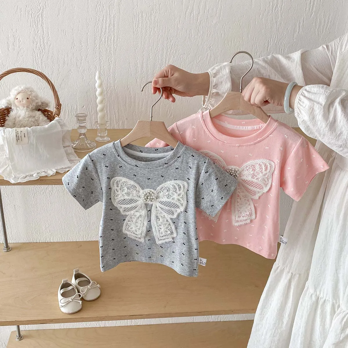 Summer girls sweet cute pearl bow short sleeve top, girls fashion versatile short sleeve T-shirt, very suitable for going out to