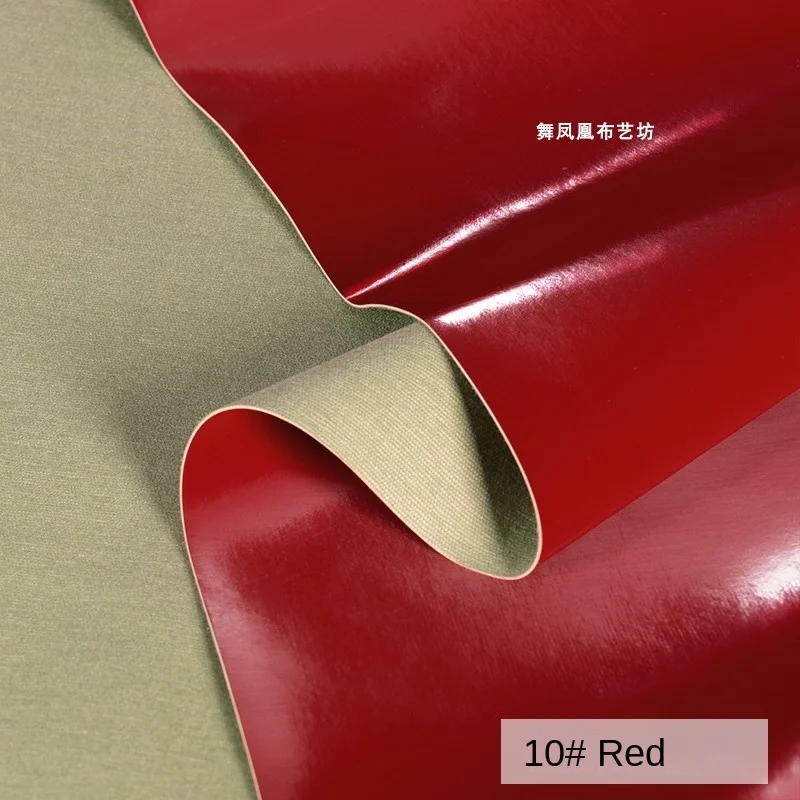 The Leather Fabric Thick Non Elastic Bright Red Silk Texture Smooth Soft Apparel Sewing Fabric Wholesale Cloth Meters Material