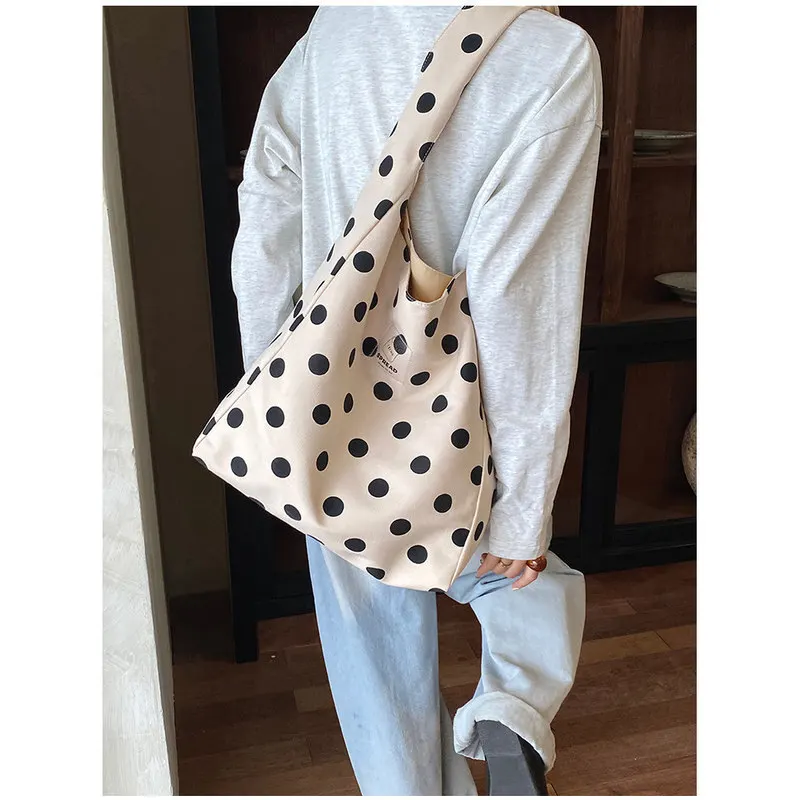 Korean-style polka dot canvas tote bag for women2026New autumn collection: large-capacity, fashionable shoulder bag, casual and