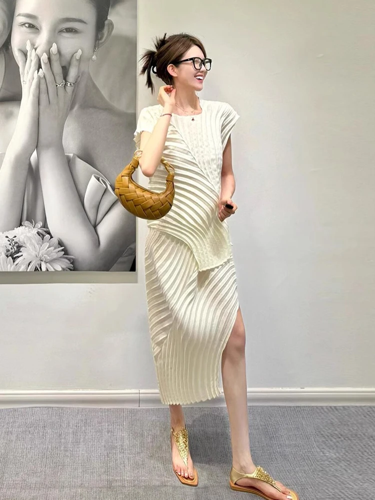 

Fashionable Pure Color Women's Outfit with Slit And Pleats Midi Skirt And Top Set by Sanza Art Creation for Summer 2026