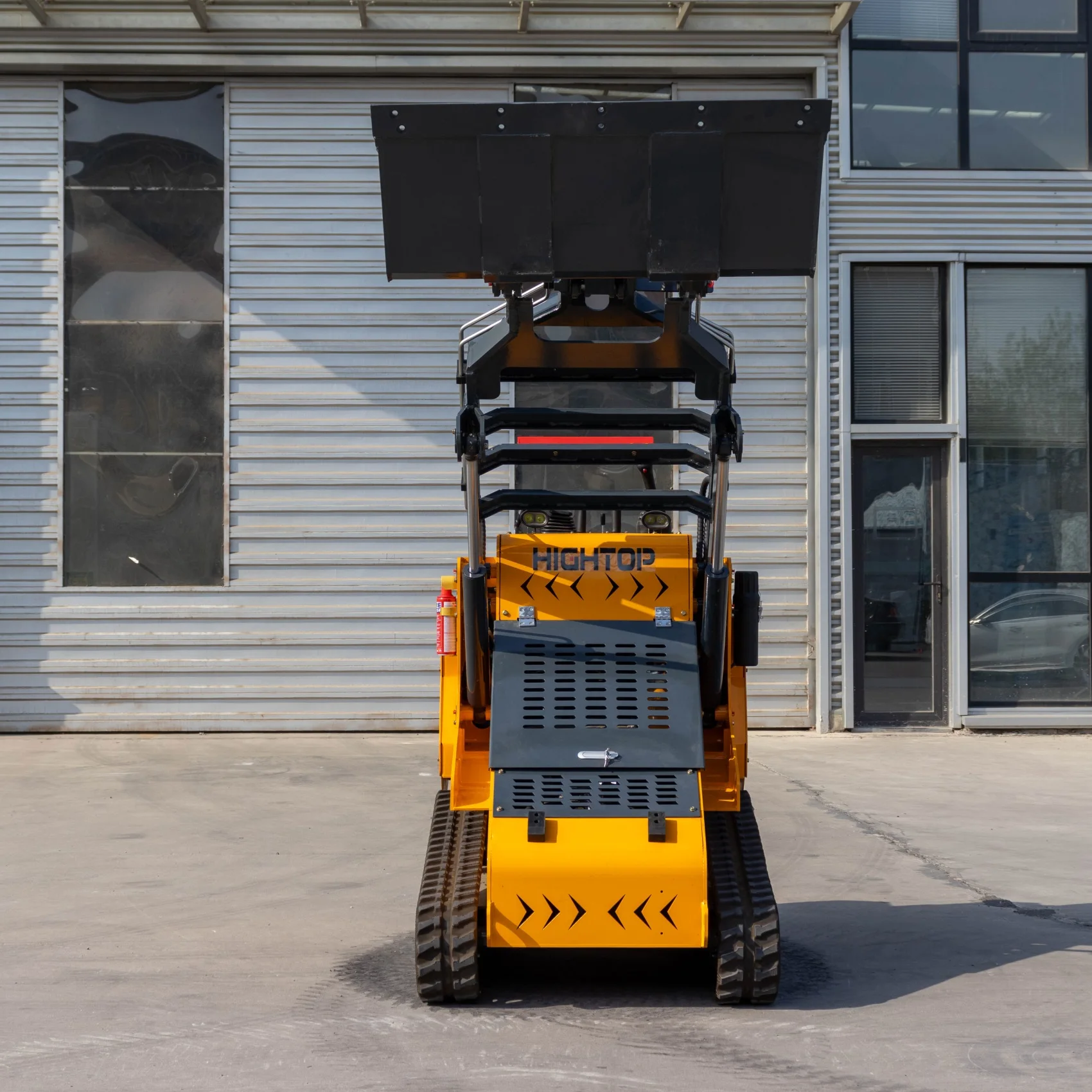 Dostosowany, wielofunkcyjny (4 w 1) ładowarka odkładająca koła, z napędem diesla, na gąsienicach, dostępna w magazynie w USA.