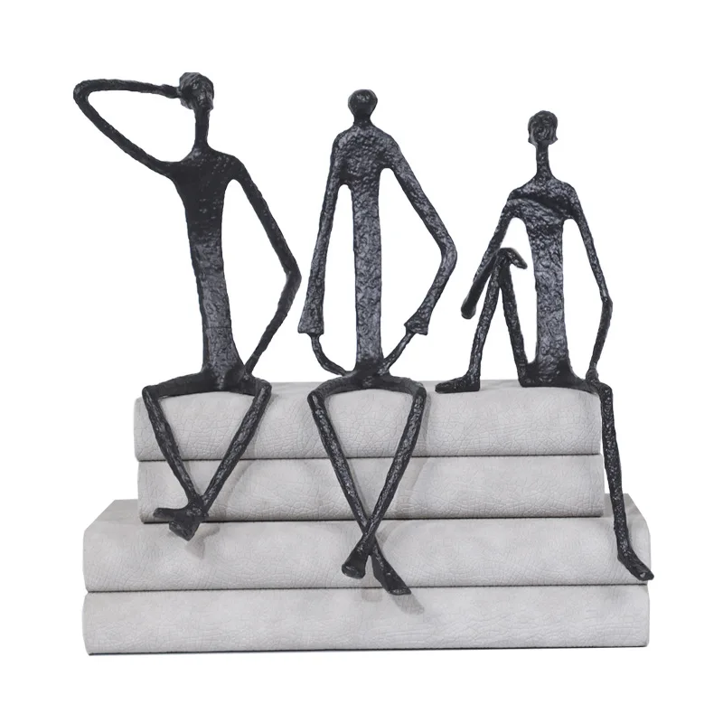 

Modern minimalist cast iron man artistic creative abstract figure sitting decoration soft furnishings hotel sales office