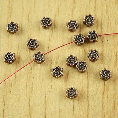 

100pcs :5.2mm copper-tone plum flower spacer beads h1879