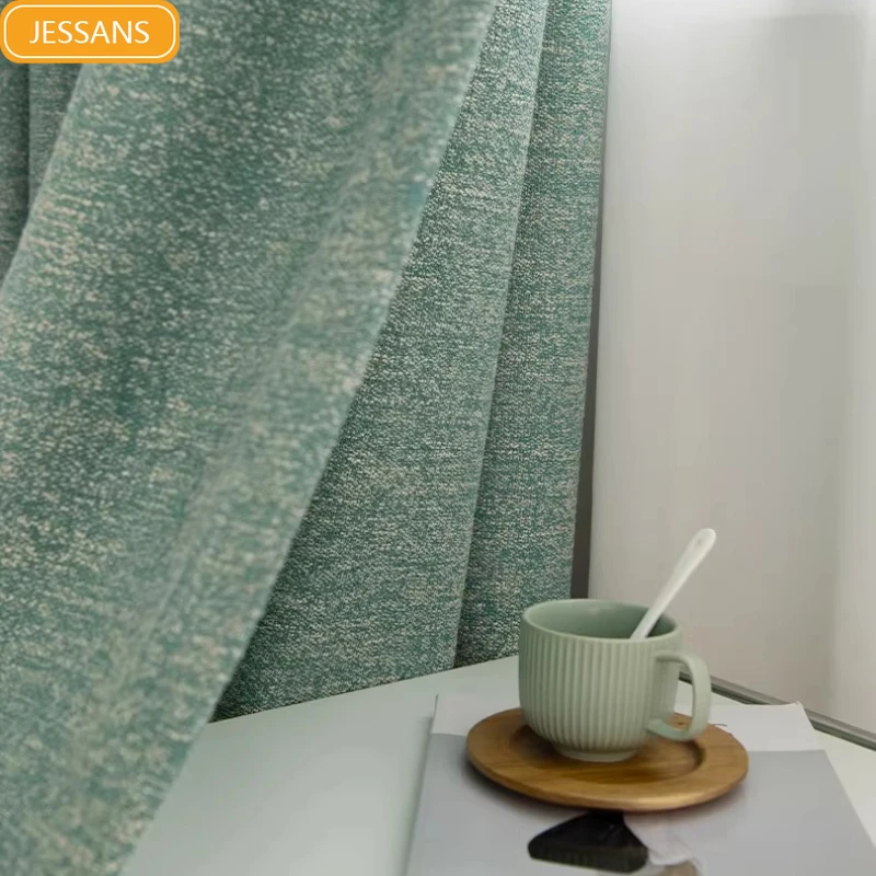 

Новые плотные жаккардовые шторы из шенилла цвета озерной зелени с эффектом затемнения для гостиной, спальни, французских окон, балконов. Изготовление на заказ.