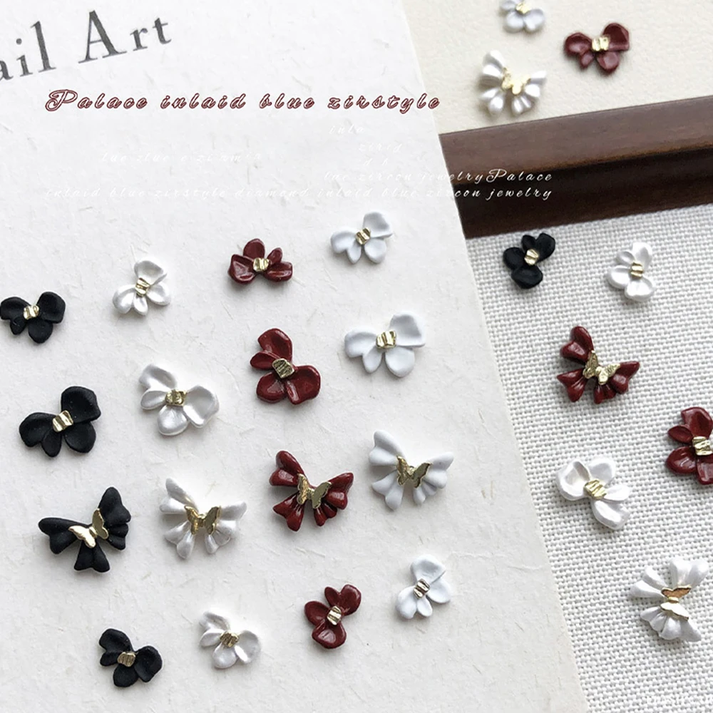 5 pezzi bianco/nero/vino rosso farfalla fiore decorazioni per unghie artistiche fiocco in lega 3D ciondoli per unghie eleganti accessori per unghie artigianali alla moda