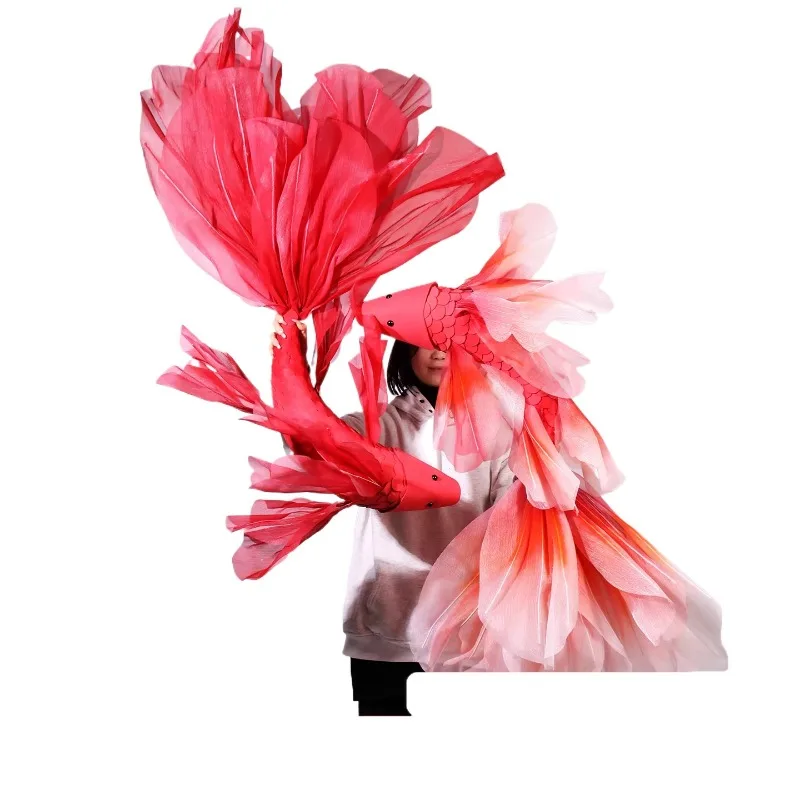 

Wedding shopping mall arranges red festival koi props, shop window activity atmosphere, paper flower koi