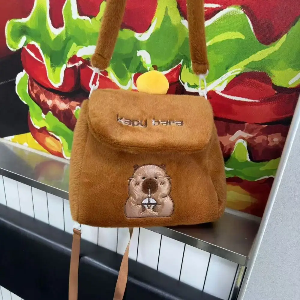 Mochila de felpa de capibara naranja, colección de hombros rellenos, mochila de doble uso, portátil, de gran capacidad