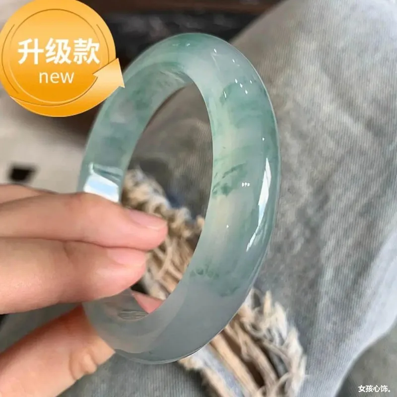 Selected high-quality, natural Burmese jade bangles with a lustrous, green, and patterned appearance; a fashionable jade bracele