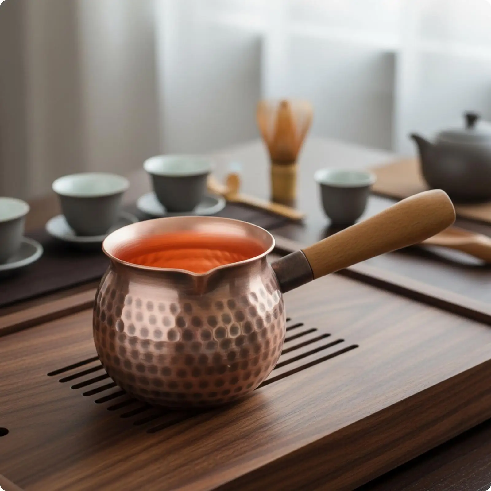 Hammered Copper Tea Decanter Pouring Vessel with Flared Spout and Heat Resistant Wooden Side Grip