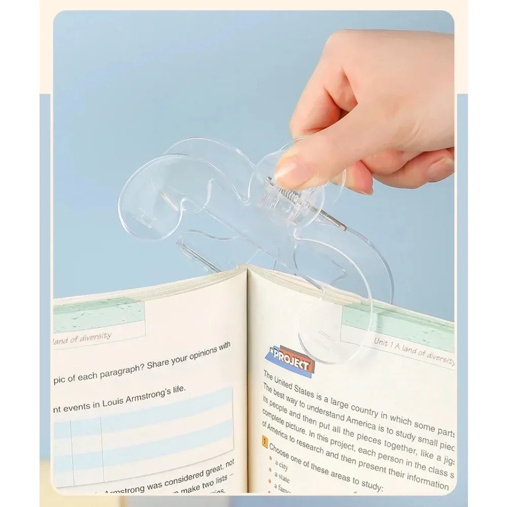 Clip de plástico transparente para libros con soporte, ayuda para la lectura, clip fijo para libros, marcapáginas, papelería, suministros escolares, 1 ud.