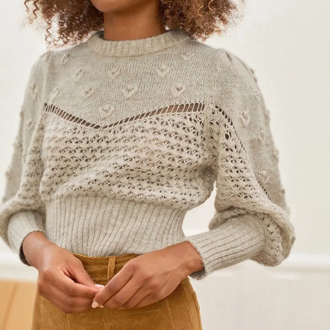 

Knitted round neck long sleeved hollow pullover from European and American origin manufacturers, simple in spring and autumn