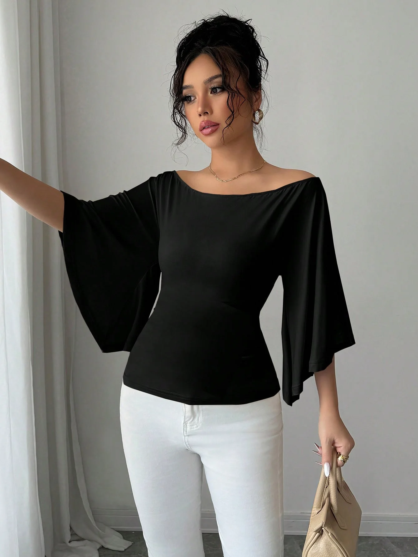 Nuevo top de manga de murciélago de un solo hombro de color liso para mujer, elegante vestido de mujer de media manga con un toque de diseño