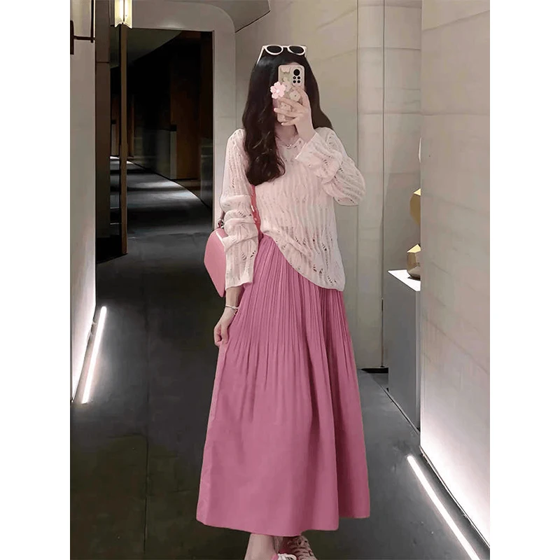 Top ampio scavato lavorato a maglia Faion all'inizio della primavera con gonna dimagrante Set da due pezzi Ensemble di abbigliamento alla moda da donna