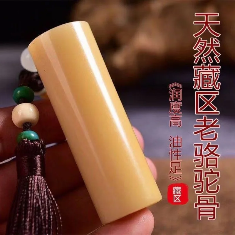 Camel leg bone cylindrical pendant