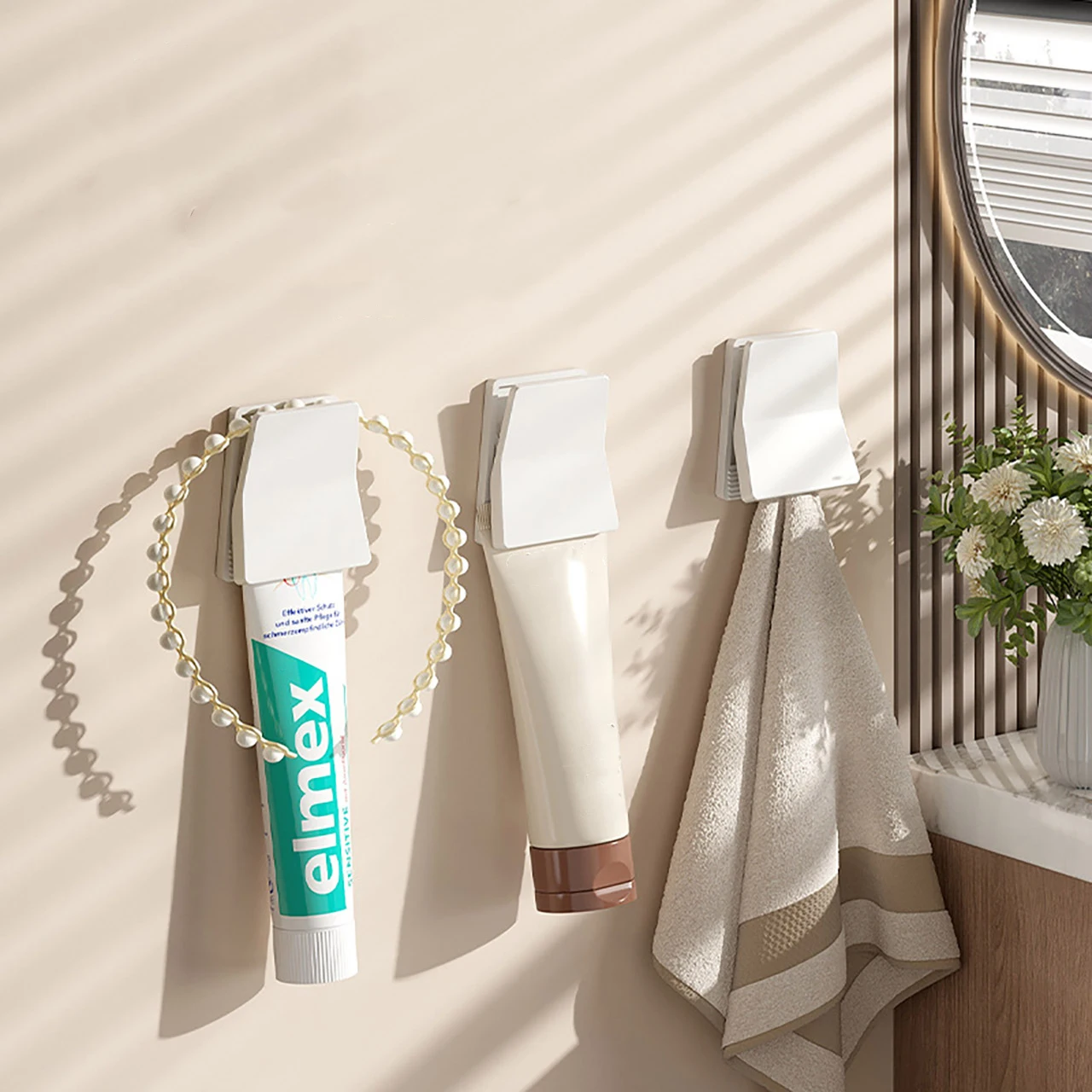 

Wall Mounted Toothpaste Holder Rack Hanging Clips for Facial Cleanser Towel Storage Hooks Bathroom Space Saving Organizer Rack