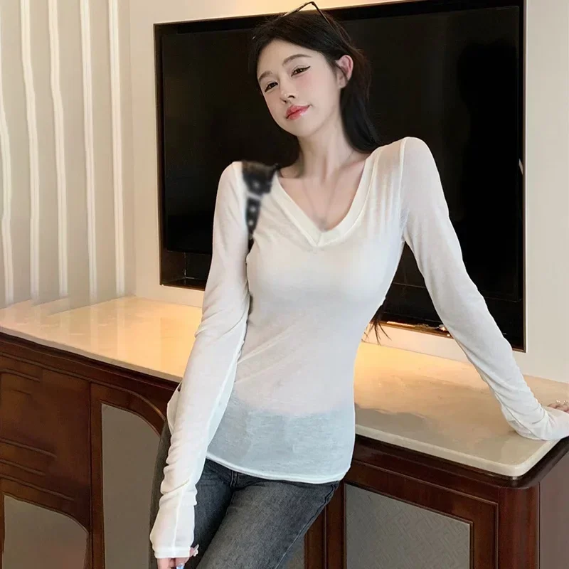 Women's top Solid color V-neck Revealing waist Women's long sleeves