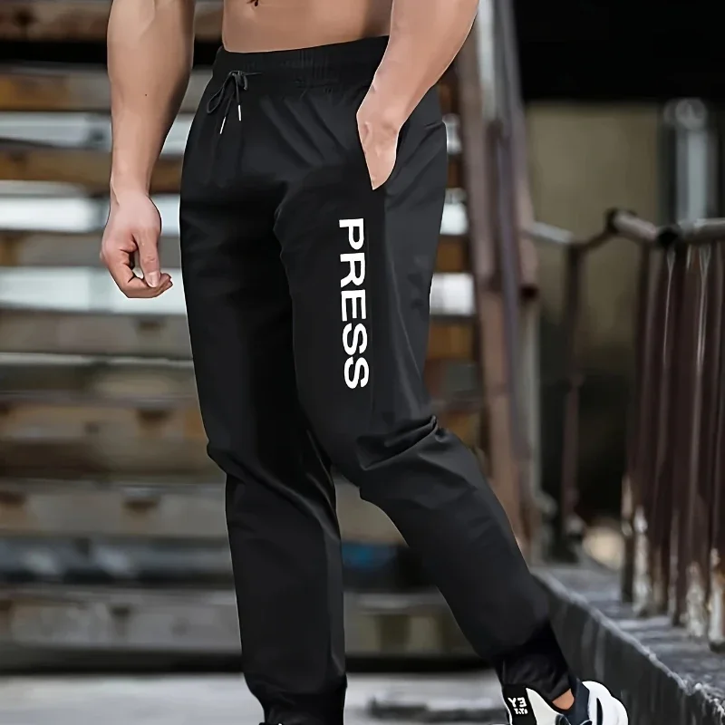 

Outdoor camping quick-drying men pants spring and summer thin section of the trend of sports pants casual loose nine-minute pant