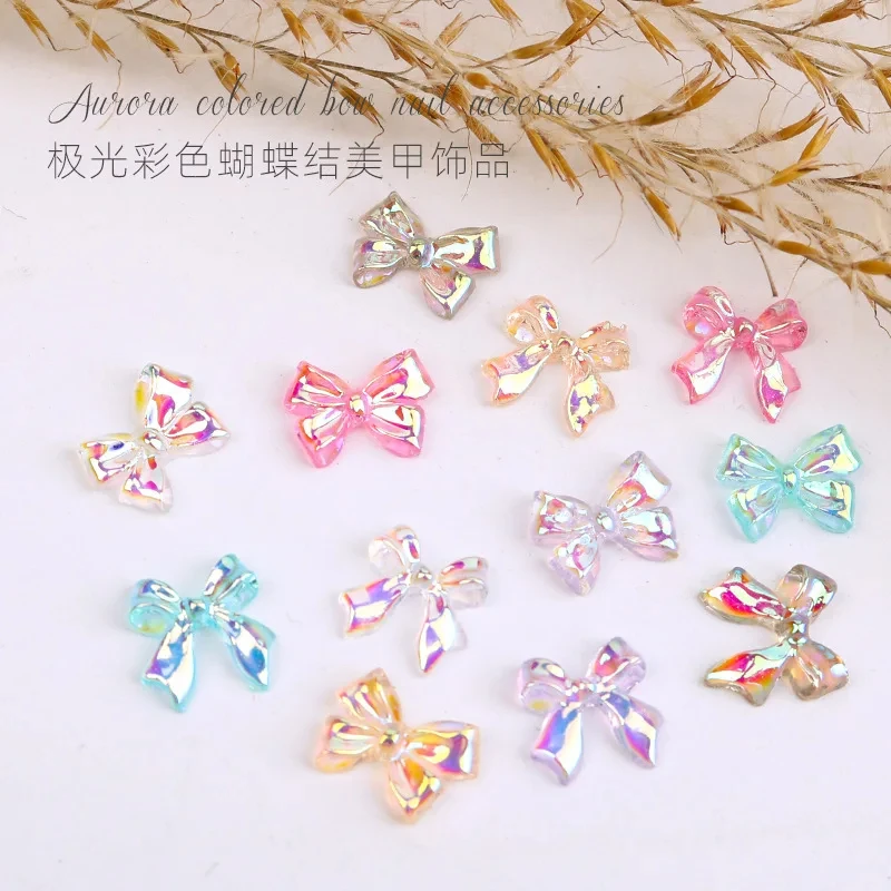 100pcs/Bag Flowing Light Bow Ab Color Ribbon Bowknot Bow Ties French Elegance Ballet Princess Acrylic Nail Charms Decorations