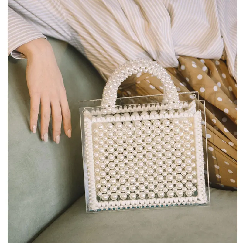 Pure hand-beaded Pearl Shoutibaoyakeli 2019 new fashion temperament women\'s single shoulder oblique span knitting bag