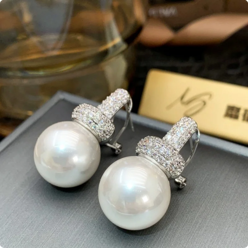 un-par-de-hermosos-pendientes-redondos-naturales-de-perlas-blancas-del-mar-del-sur-de-china-de-10-11-mm-plata-925