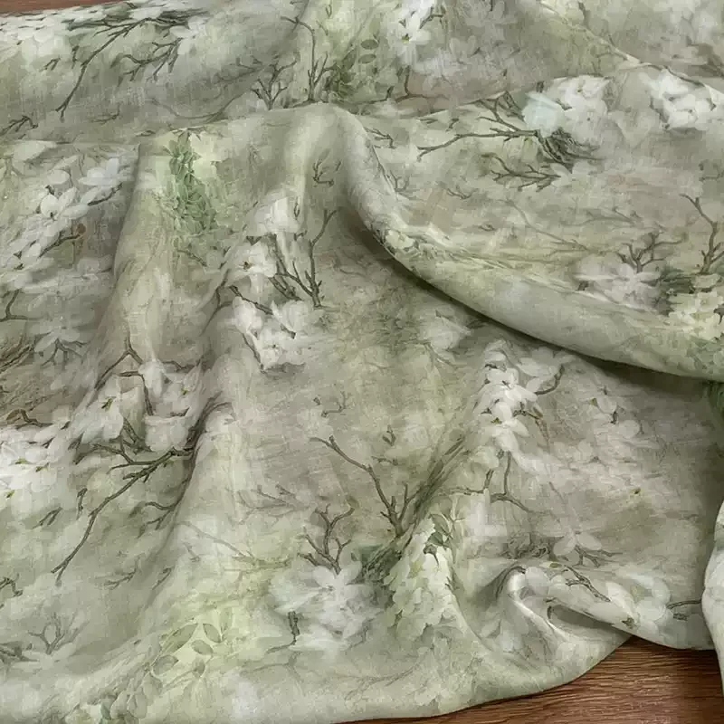 

Pure ramie grass green printed fabric, used for making high-end summer clothing sewing fabrics