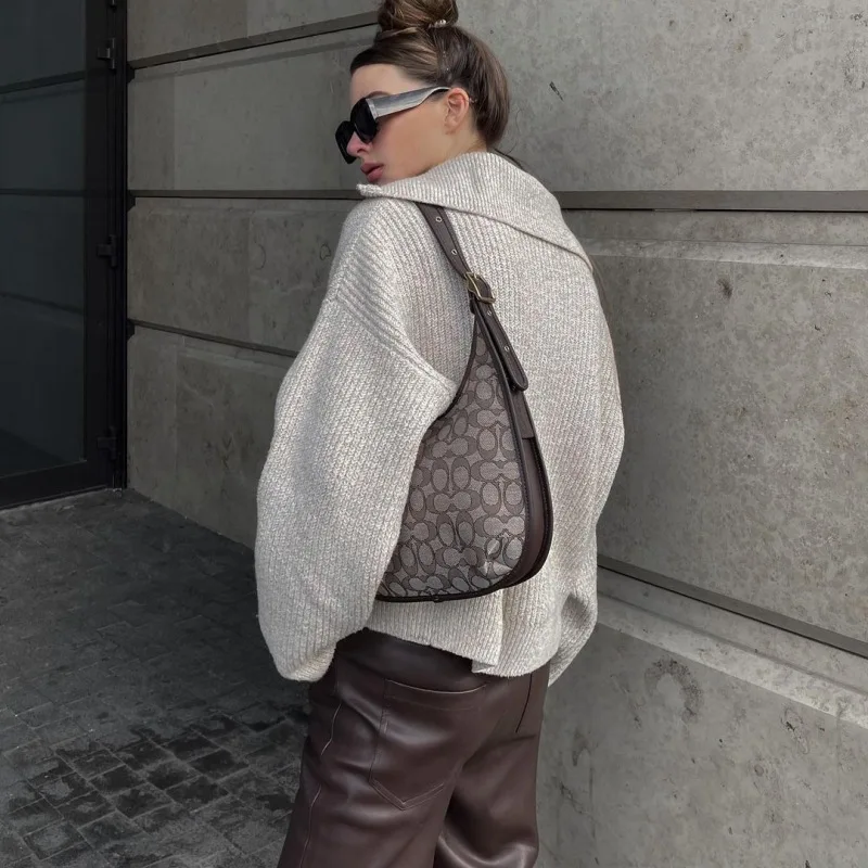 2025 Nuovo europeo e americano retrò a maniche lunghe Top design allentato Flip scollo a V Pullover maglione lavorato a maglia da donna vestiti y2k